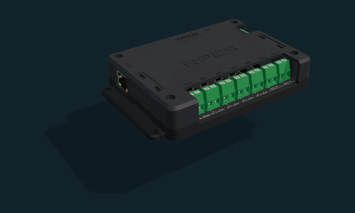 An RPCS field device assembled: a matte black flange-mounted enclosure with the RPCS wordmark on the lid and a row of green pluggable terminal blocks along the front face.